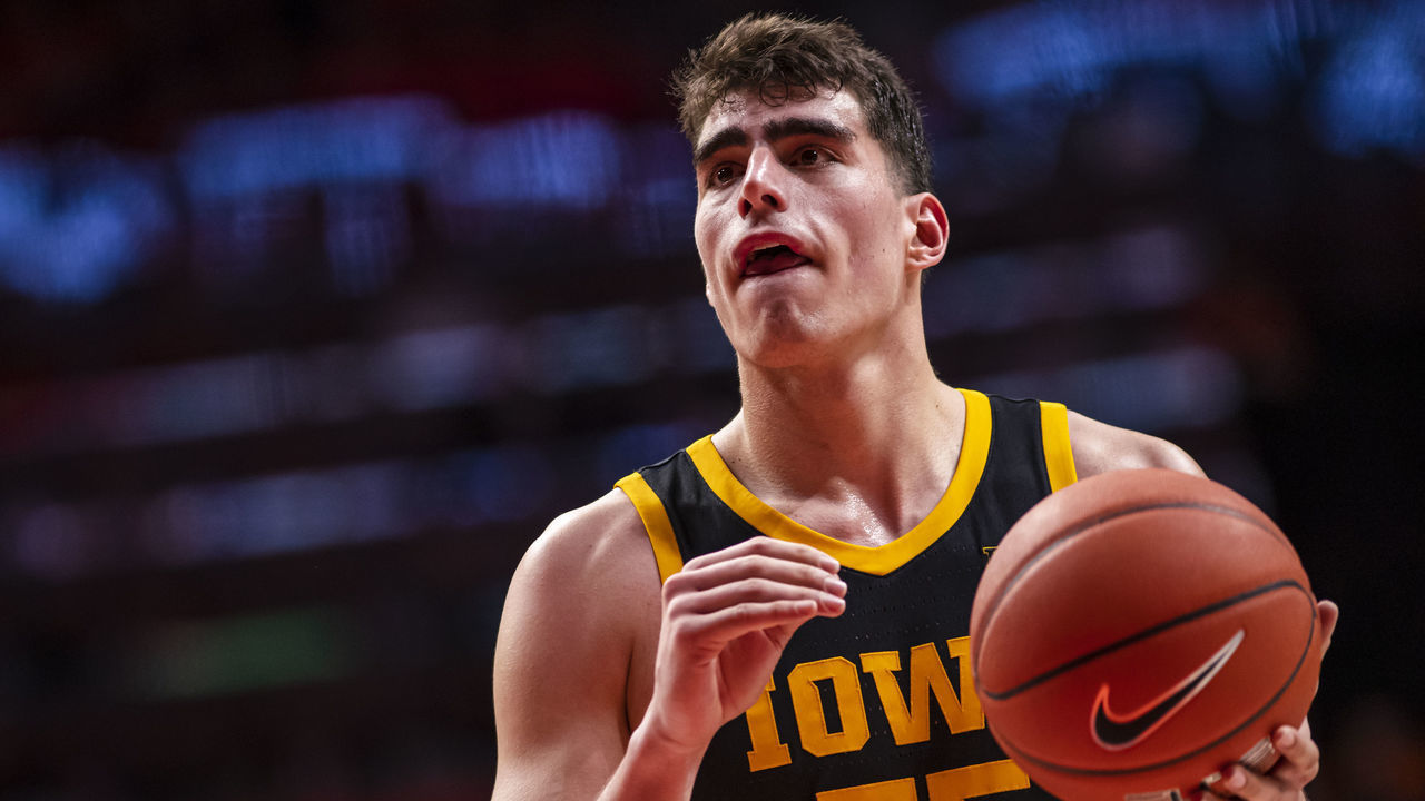 CHAMPAIGN, IL - MARCH 08: Luka Garza #55 of the Iowa Hawkeyes shoots a free throw during the game against the Illinois Fighting Illini at State Farm Center on March 8, 2020 in Champaign, Illinois.