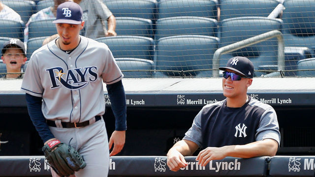 NEW YORK, NY - AUGUST 16: (NEW YORK DAILIES OUT) Blake Snell #4 of the Tampa Bay Rays in action against Aaron Judge #99 of the New York Yankees at Yankee Stadium on August 16, 2018 in the Bronx borough of New York City. The Rays defeated the Yankees 3-1.