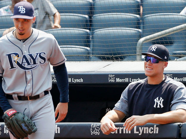 NEW YORK, NY - AUGUST 16: (NEW YORK DAILIES OUT) Blake Snell #4 of the Tampa Bay Rays in action against Aaron Judge #99 of the New York Yankees at Yankee Stadium on August 16, 2018 in the Bronx borough of New York City. The Rays defeated the Yankees 3-1.