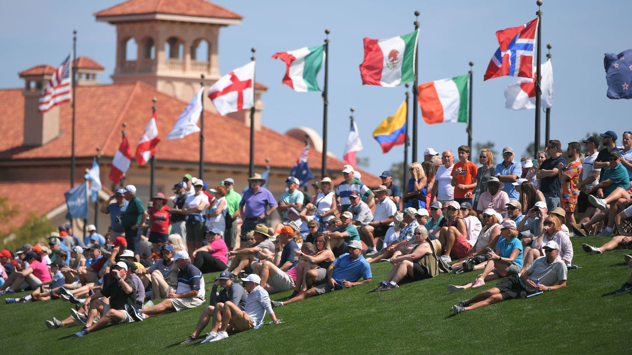 PONTE VEDRA BEACH, FL - MARCH 12: Fans watch play around the third hole during the first round of THE PLAYERS Championship on THE PLAYERS Stadium Course at TPC Sawgrass on March 12, 2020, in Ponte Vedra Beach, FL.