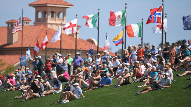 PONTE VEDRA BEACH, FL - MARCH 12: Fans watch play around the third hole during the first round of THE PLAYERS Championship on THE PLAYERS Stadium Course at TPC Sawgrass on March 12, 2020, in Ponte Vedra Beach, FL.