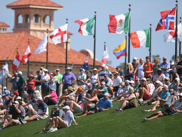PONTE VEDRA BEACH, FL - MARCH 12: Fans watch play around the third hole during the first round of THE PLAYERS Championship on THE PLAYERS Stadium Course at TPC Sawgrass on March 12, 2020, in Ponte Vedra Beach, FL.
