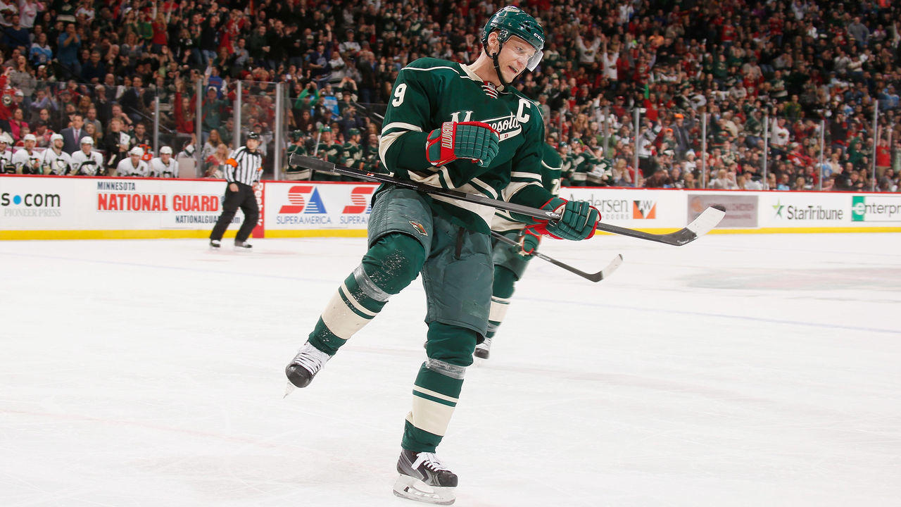 ST. PAUL, MN - APRIL 5: Mikko Koivu #9 of the Minnesota Wild celebrates after scoring a goal against the Pittsburgh Penguins during the game on April 5, 2014 at the Xcel Energy Center in St. Paul, Minnesota.
