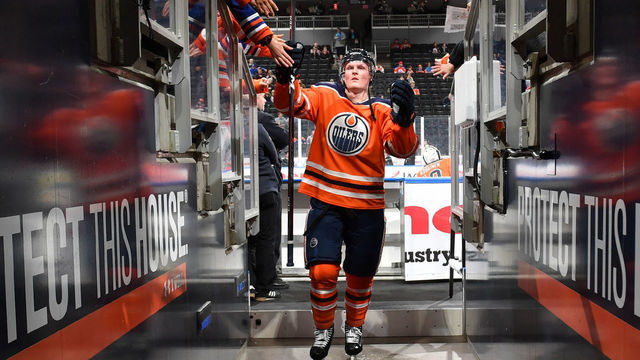 EDMONTON, AB - JANUARY 20: Colby Cave #12 of the Edmonton Oilers walks to the dressing room prior to the game against the Carolina Hurricanes on January 20, 2019 at Rogers Place in Edmonton, Alberta, Canada.