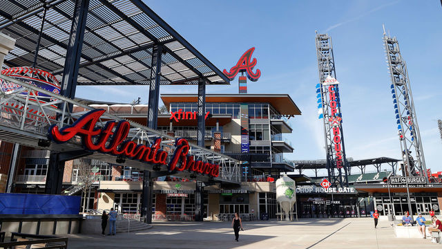 ATLANTA, GEORGIA - MARCH 26: A few patrons are seen around The Battery Atlanta connected to Truist Park, home of the Atlanta Braves, on March 26, 2020 in Atlanta, Georgia. Major League Baseball has postponed the start of its season indefinitely due to the coronavirus (COVID-19) outbreak.