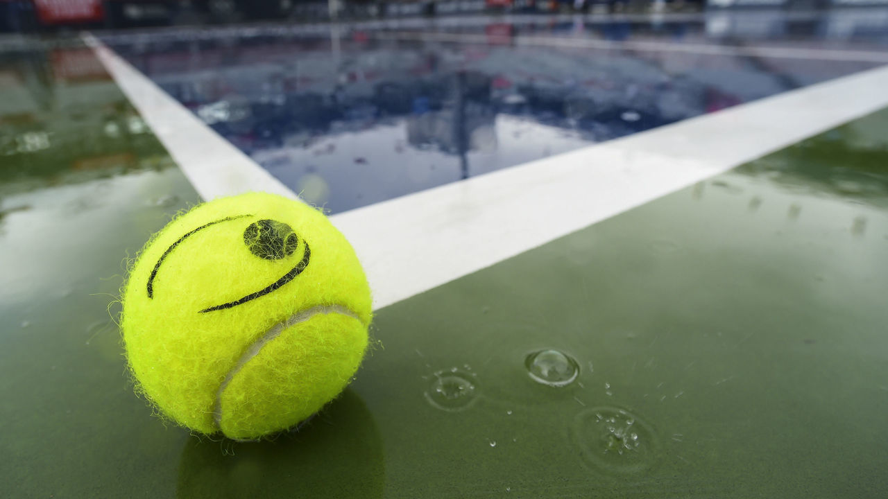 MONTREAL, QC - AUGUST 10: Rain delays play as a ball sits on centre court during day 9 of the Rogers Cup at IGA Stadium on August 10, 2019 in Montreal, Quebec, Canada.