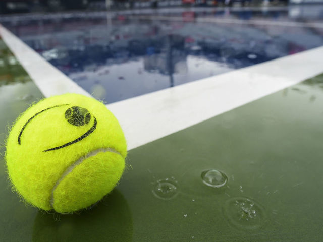 MONTREAL, QC - AUGUST 10: Rain delays play as a ball sits on centre court during day 9 of the Rogers Cup at IGA Stadium on August 10, 2019 in Montreal, Quebec, Canada.