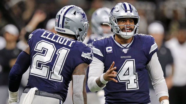 NEW ORLEANS, LA - SEPTEMBER 29: Dallas Cowboys quarterback Dak Prescott (4) changes the play with running back Ezekiel Elliott (21) during the game between the New Orleans Saints and the Dallas Cowboys on September 29, 2019 at the Mercedes-Benz Superdome in New Orleans, LA.
