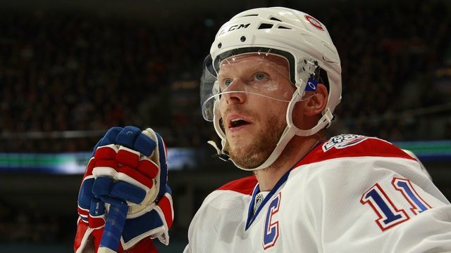 VANCOUVER, CANADA - FEBRUARY 15: Saku Koivu #11 of the Montreal Canadiens looks on from the bench during their game against the Vancouver Canucks at General Motors Place on February 15, 2009 in Vancouver, British Columbia, Canada. The Canucks won 4-2.
