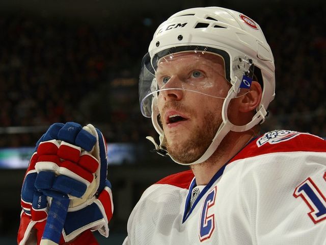 VANCOUVER, CANADA - FEBRUARY 15: Saku Koivu #11 of the Montreal Canadiens looks on from the bench during their game against the Vancouver Canucks at General Motors Place on February 15, 2009 in Vancouver, British Columbia, Canada. The Canucks won 4-2.
