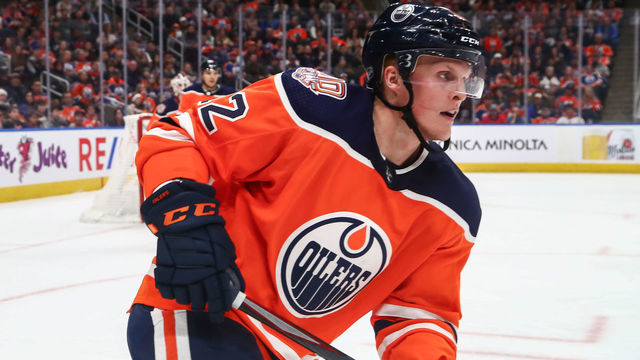 EDMONTON, AB - FEBRUARY 19: Edmonton Oilers Center Colby Cave (12) skates up ice in the second period during the Edmonton Oilers game versus the Arizona Coyotes on February 19, 2019 at Rogers Place in Edmonton, AB.