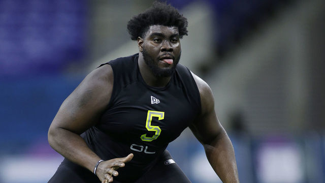 INDIANAPOLIS, IN - FEBRUARY 28: Offensive lineman Mekhi Becton of Louisville runs a drill during the NFL Combine at Lucas Oil Stadium on February 28, 2020 in Indianapolis, Indiana.