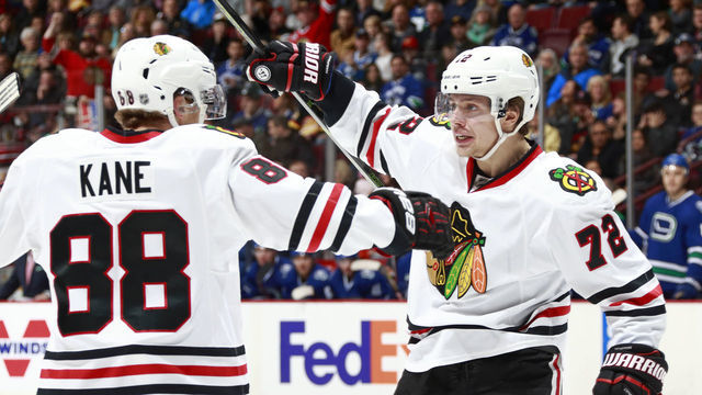 VANCOUVER, BC - NOVEMBER 19: Artemi Panarin #72 of the Chicago Blackhawks is congratulated by teammate Patrick Kane #88 after scoring during their NHL game against the Vancouver Canucks at Rogers Arena November 19, 2016 in Vancouver, British Columbia, Canada.