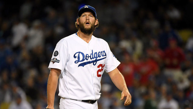 LOS ANGELES, CALIFORNIA - OCTOBER 09: Clayton Kershaw #22 of the Los Angeles Dodgers reacts as he leaves the game after giving up back to back home runs in the eighth inning of game five of the National League Division Series against the Washington Nationals at Dodger Stadium on October 09, 2019 in Los Angeles, California.