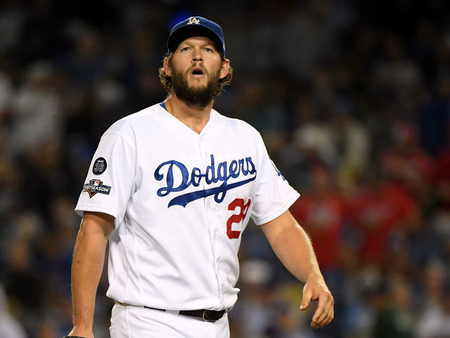 LOS ANGELES, CALIFORNIA - OCTOBER 09: Clayton Kershaw #22 of the Los Angeles Dodgers reacts as he leaves the game after giving up back to back home runs in the eighth inning of game five of the National League Division Series against the Washington Nationals at Dodger Stadium on October 09, 2019 in Los Angeles, California.