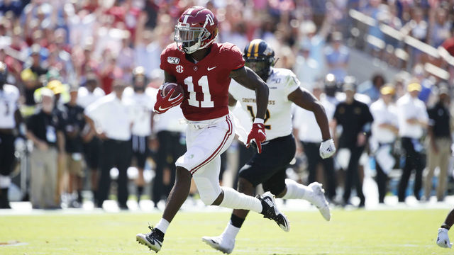 TUSCALOOSA, AL - SEPTEMBER 21: Henry Ruggs III #11 of the Alabama Crimson Tide runs for a touchdown after catching a pass during a game against the Southern Mississippi Golden Eagles at Bryant-Denny Stadium on September 21, 2019 in Tuscaloosa, Alabama. Alabama defeated Southern Miss 49-7.