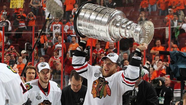 PHILADELPHIA - JUNE 09: Kris Versteeg #32 of the Chicago Blackhawks celebrates with the Stanley Cup after defeating the Philadelphia Flyers 4-3 in overtime in Game Six of the 2010 NHL Stanley Cup Final at the Wachovia Center on June 9, 2010 in Philadelphia, Pennsylvania.