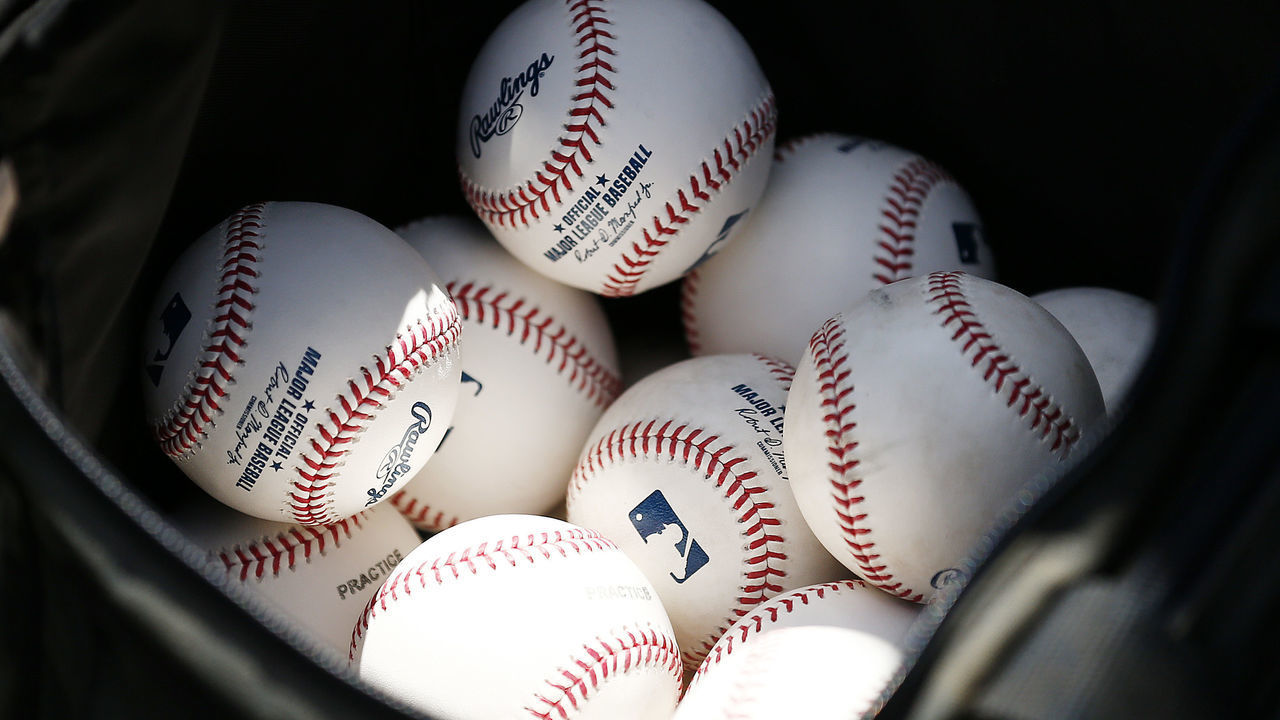 VARIOUS CITIES, - MARCH 12: A detail of baseballs during a Grapefruit League spring training game between the Washington Nationals and the New York Yankees at FITTEAM Ballpark of The Palm Beaches on March 12, 2020 in West Palm Beach, Florida. Many professional and college sports are canceling or postponing their games due to the ongoing threat of the Coronavirus (COVID-19) outbreak.