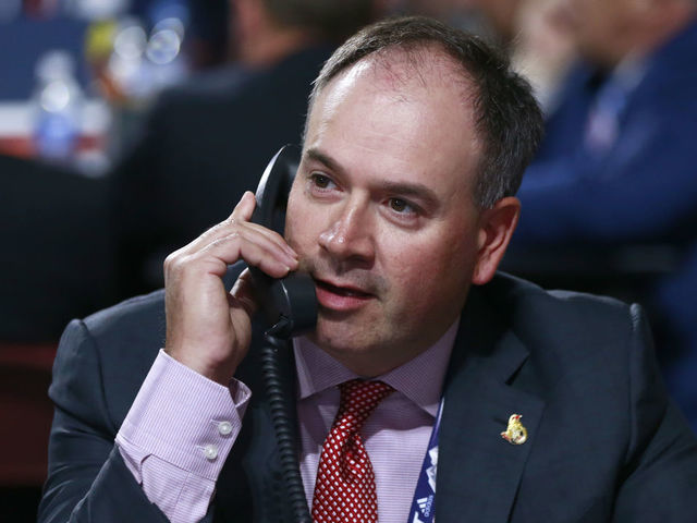 VANCOUVER, BRITISH COLUMBIA - JUNE 22: General manager Pierre Dorion of the Ottawa Senators talks on the phone on the draft floor during Rounds 2-7 of the 2019 NHL Draft at Rogers Arena on June 22, 2019 in Vancouver, Canada.