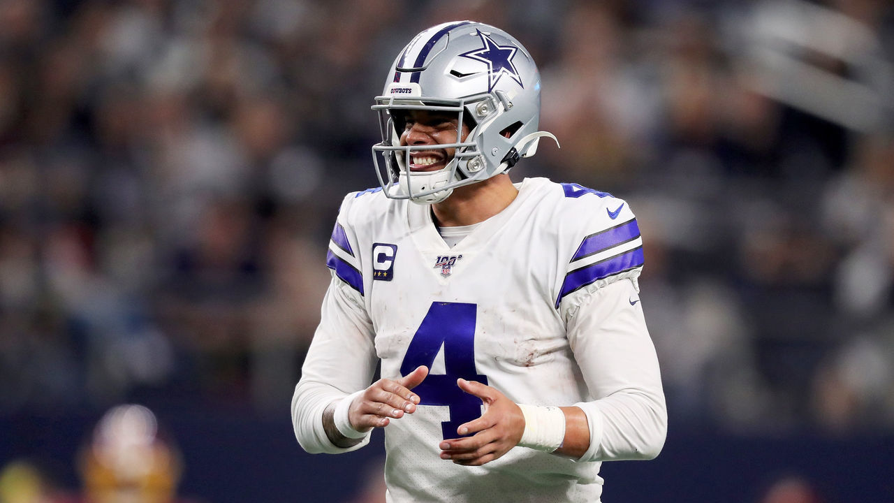 ARLINGTON, TEXAS - DECEMBER 29: Dak Prescott #4 of the Dallas Cowboys celebrates in the third quarter against the Washington Redskins in the game at AT&T Stadium on December 29, 2019 in Arlington, Texas.