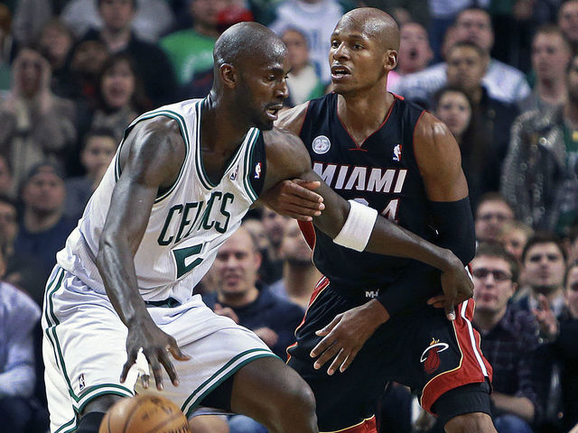 BOSTON - JANUARY 27: The Celtics' Kevin Garnett, left, was guarded by former teammate and current Heat guard Ray Allen in the fourth quarter as the Boston Celtics hosted the Miami Heat in an NBA regular season game at the TD Garden.