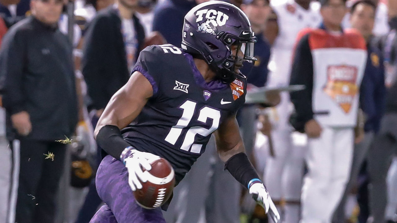 PHOENIX, AZ - DECEMBER 26: TCU Horned Frogs cornerback Jeff Gladney (12) runs back an interception during the Cheez-It Bowl between the California Golden Bears and the TCU Horned Frogs on December 26, 2018 at Chase Field in Phoenix, Arizona.
