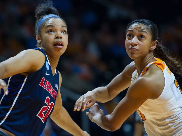 KNOXVILLE, TN - MARCH 16: Tennessee Lady Volunteers guard/forward Jaime Nared (31) and Liberty Lady Flames forward Keyen Green (21) battle for position during a game between the Tennessee Lady Volunteers and Liberty Lady Flames on March 16, 2018, at Thompson-Boling Arena in Knoxville, TN. Tennessee defeated Liberty 100-60.