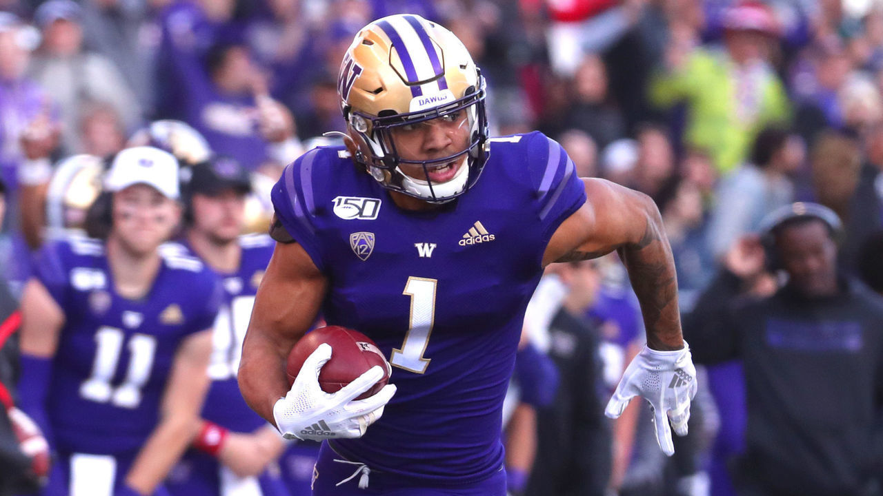 SEATTLE, WASHINGTON - NOVEMBER 02: Hunter Bryant #1 of the Washington Huskies runs for a 40 yard touchdown against the Utah Utes in the third quarter during their game at Husky Stadium on November 02, 2019 in Seattle, Washington.