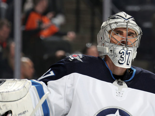 PHILADELPHIA, PA - FEBRUARY 22: Connor Hellebuyck #37 of the Winnipeg Jets looks on during a stoppage in play against the Philadelphia Flyers on February 22, 2020 at the Wells Fargo Center in Philadelphia, Pennsylvania.