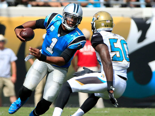 JACKSONVILLE, FL - SEPTEMBER 13: Cam Newton #1 of the Carolina Panthers is defended by Telvin Smith #50 of the Jacksonville Jaguars during the game at EverBank Field on September 13, 2015 in Jacksonville, Florida.