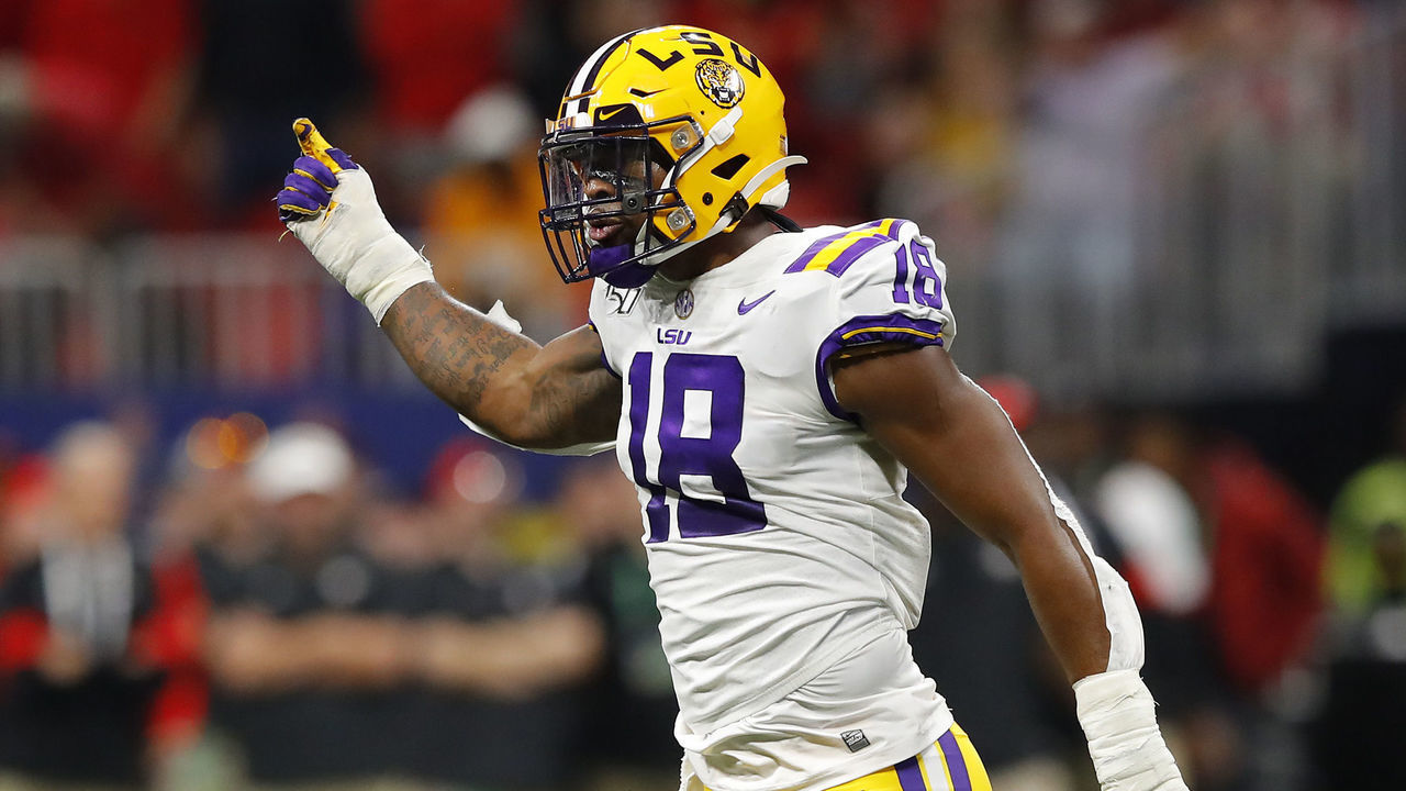 ATLANTA, GEORGIA - DECEMBER 07: K'Lavon Chaisson #18 of the LSU Tigers reacts in the first half against the Georgia Bulldogs during the SEC Championship game at Mercedes-Benz Stadium on December 07, 2019 in Atlanta, Georgia.