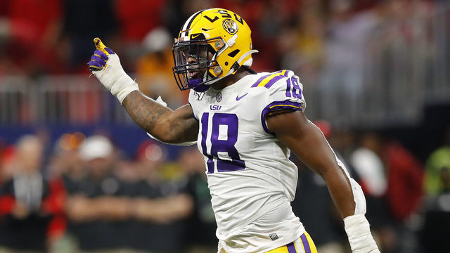 ATLANTA, GEORGIA - DECEMBER 07: K'Lavon Chaisson #18 of the LSU Tigers reacts in the first half against the Georgia Bulldogs during the SEC Championship game at Mercedes-Benz Stadium on December 07, 2019 in Atlanta, Georgia.