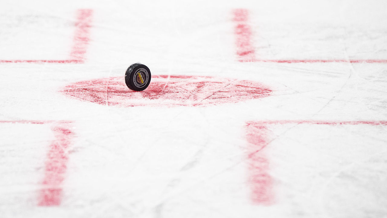 COLOGNE, GERMANY - OCTOBER 03: The puck with the logo is seen on the ice duirng the NHL Global Series Challenge game between Edmonton Oilers and Kolner Haie at Lanxess Arena on October 3, 2018 in Cologne, Germany.