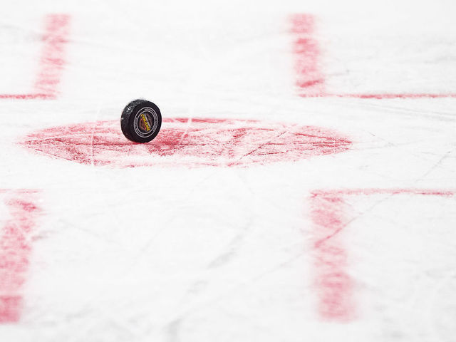 COLOGNE, GERMANY - OCTOBER 03: The puck with the logo is seen on the ice duirng the NHL Global Series Challenge game between Edmonton Oilers and Kolner Haie at Lanxess Arena on October 3, 2018 in Cologne, Germany.