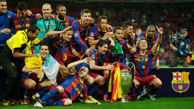 Barcelona celebrate winning the UEFA Champions League Trophy