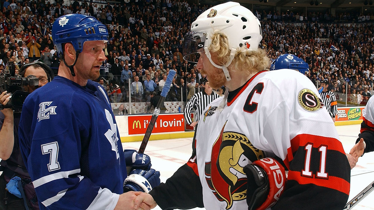 TORONTO - APRIL 20: Gary Roberts #7 of the Toronto Maple Leafs shakes hands with Daniel Alfredsson #11 the Ottawa Senators during the traditional series ending handshake after game seven of the eastern conference quarter-finals April 20, 2004 at Air Canada Centre in Toronto, Ontario. The Maple Leafs beat the Senators 4-1 to win the series 4-3.