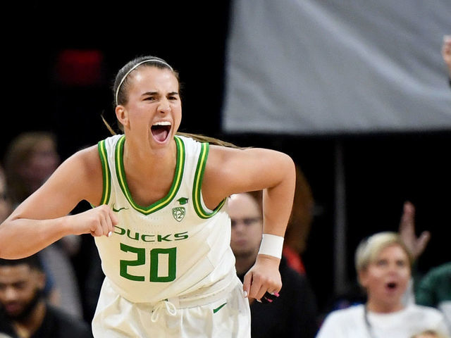 LAS VEGAS, NEVADA - MARCH 06: Sabrina Ionescu #20 of the Oregon Ducks reacts after a teammate hit a 3-pointer against the Utah Utes during the Pac-12 Conference women’s basketball tournament quarterfinals at the Mandalay Bay Events Center on March 6, 2020 in Las Vegas, Nevada. The Ducks defeated the Utes 79-59.