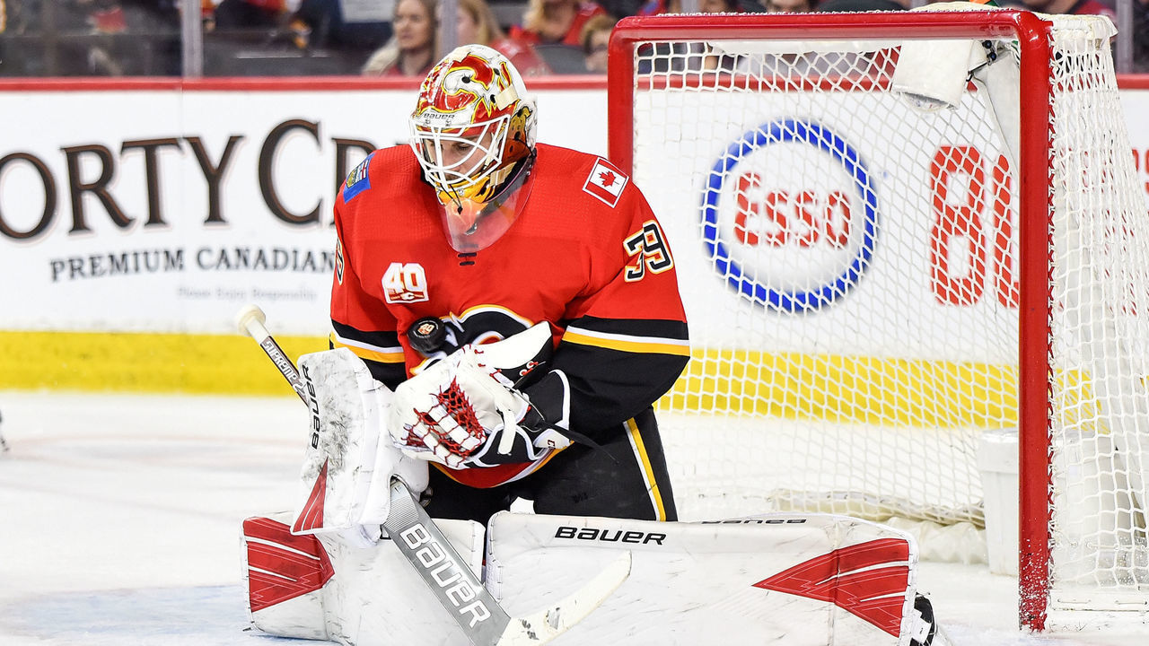 CALGARY, AB - MARCH 06: Calgary Flames Goalie Cam Talbot (39) stops the puck during the second period of an NHL game where the Calgary Flames hosted the Arizona Coyotes on March 6, 2020, at the Scotiabank Saddledome in Calgary, AB.