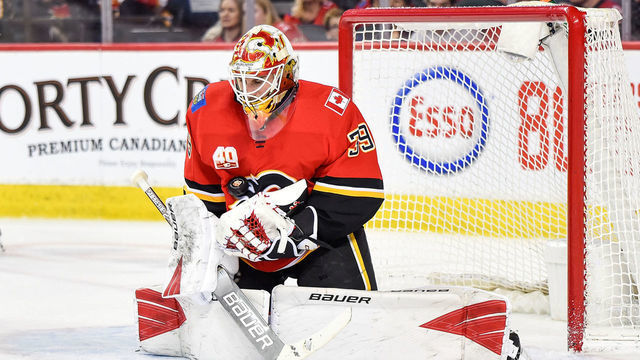 CALGARY, AB - MARCH 06: Calgary Flames Goalie Cam Talbot (39) stops the puck during the second period of an NHL game where the Calgary Flames hosted the Arizona Coyotes on March 6, 2020, at the Scotiabank Saddledome in Calgary, AB.