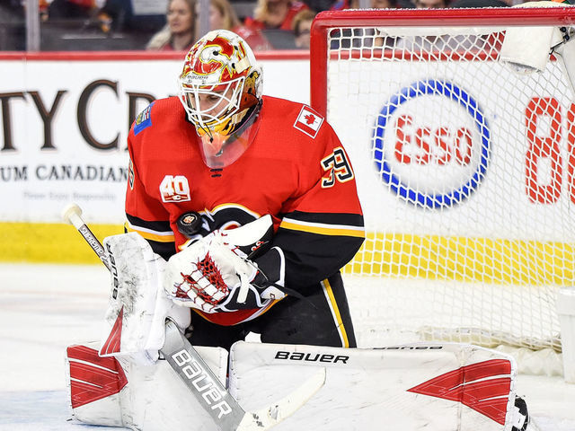 CALGARY, AB - MARCH 06: Calgary Flames Goalie Cam Talbot (39) stops the puck during the second period of an NHL game where the Calgary Flames hosted the Arizona Coyotes on March 6, 2020, at the Scotiabank Saddledome in Calgary, AB.