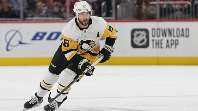 WASHINGTON, DC - FEBRUARY 23: Kris Letang #58 of the Pittsburgh Penguins skates with the puck against the Washington Capitals in the second period at Capital One Arena on February 23, 2020 in Washington, DC.