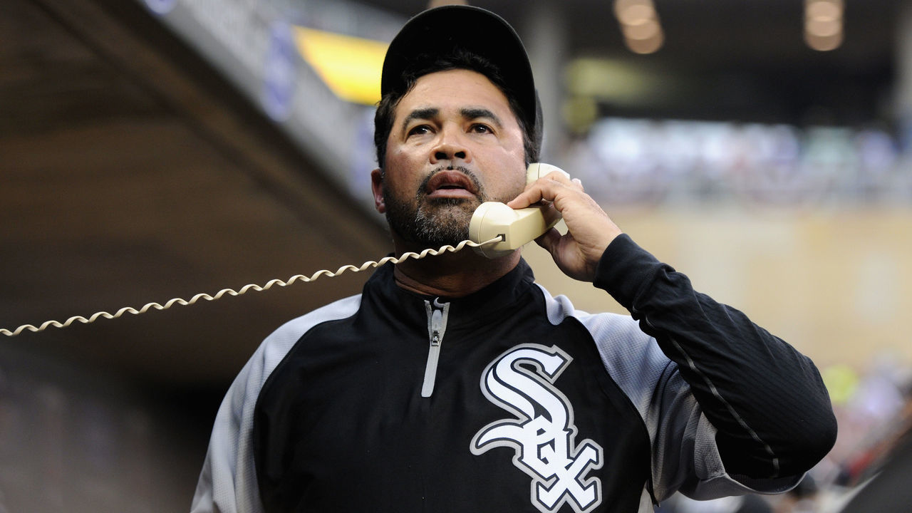 MINNEAPOLIS, MN - AUGUST 5: Ozzie Guillen #13 of the Chicago White Sox on the dugout phone during the game against the Minnesota Twins on August 5, 2011 at Target Field in Minneapolis, Minnesota.