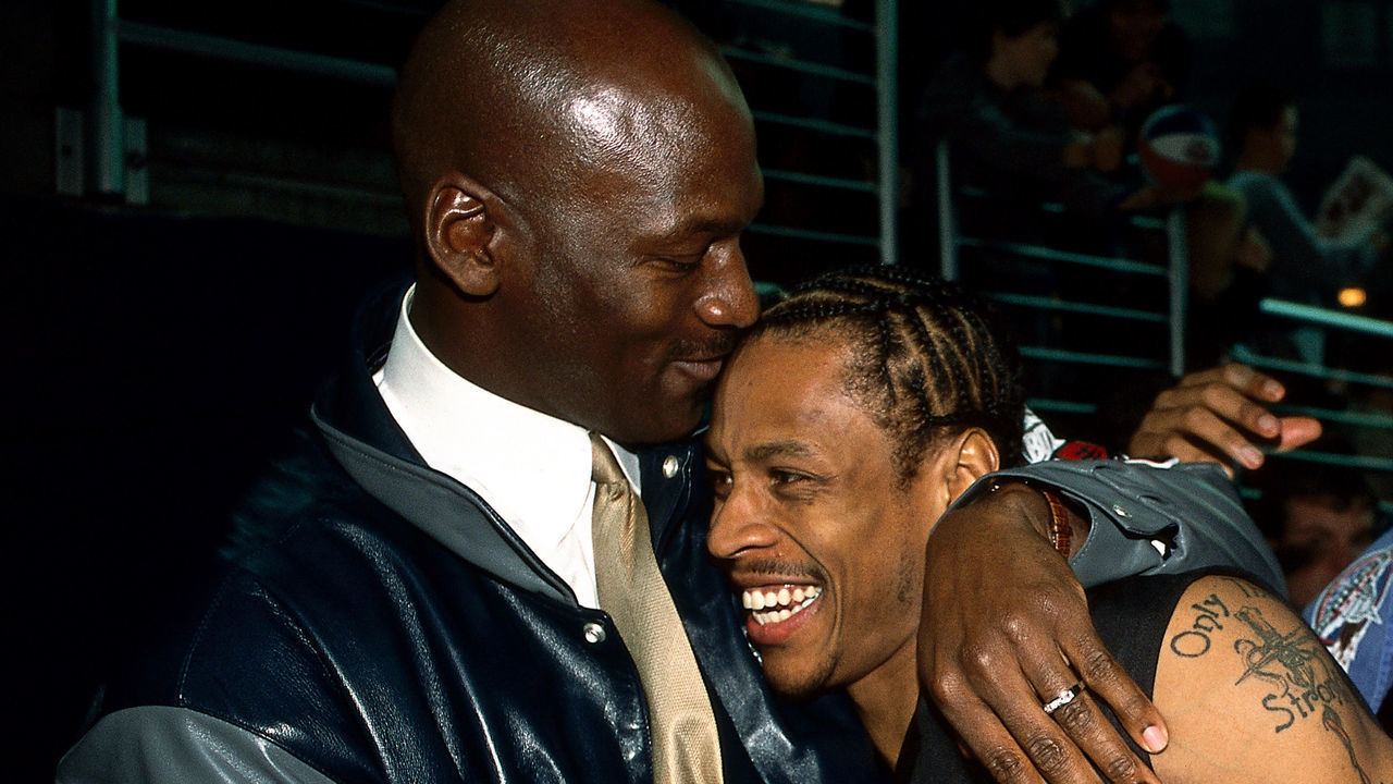 2001: Michael Jordan embraces Allen Iverson of the Philadelphia 76''ers and Stephon Marbury of the New Jersey Nets during the 2001 All Star weekend in Washington, DC. NOTE TO USER: User expressly acknowledges and agrees that, by downloading and/or using this Photograph, User is consenting to the terms and conditions of the Getty Images License Agreement. Mandatory copyright notice: Copyright 2001 NBAE Mandatory Credit: Randy Belice/NBAE/Getty Images