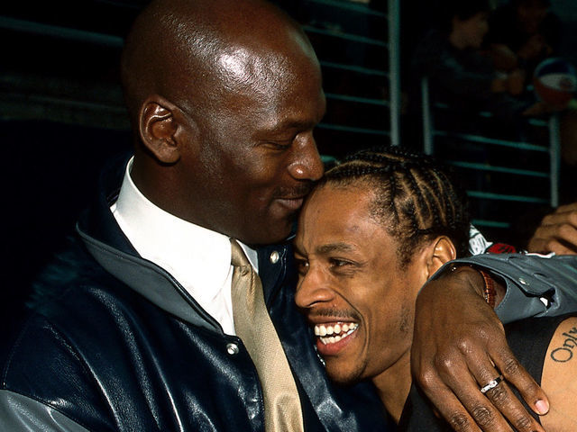 2001: Michael Jordan embraces Allen Iverson of the Philadelphia 76''ers and Stephon Marbury of the New Jersey Nets during the 2001 All Star weekend in Washington, DC. NOTE TO USER: User expressly acknowledges and agrees that, by downloading and/or using this Photograph, User is consenting to the terms and conditions of the Getty Images License Agreement. Mandatory copyright notice: Copyright 2001 NBAE Mandatory Credit: Randy Belice/NBAE/Getty Images