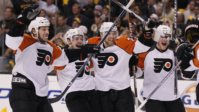 BOSTON - MAY 14: Daniel Carcillo #13, Danny Briere #48, Claude Giroux #28 and Matt Carle #25 of the Philadelphia Flyers celebrate the win over the Boston Bruins in Game Seven of the Eastern Conference Semifinals during the 2010 NHL Stanley Cup Playoffs at TD Garden on May 14, 2010 in Boston, Massachusetts. The Flyers defeated the Bruins 4-3.