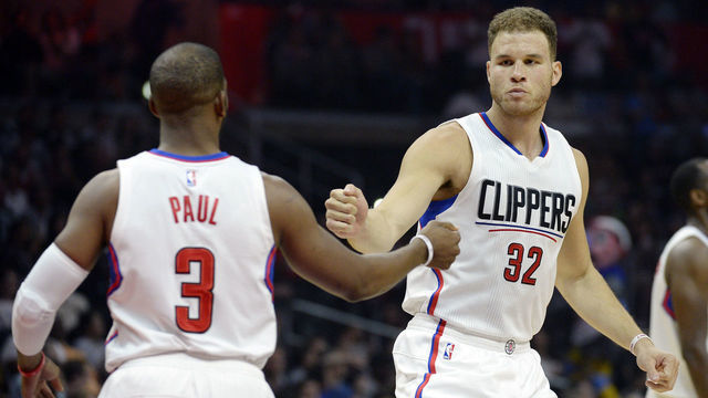 LOS ANGELES, CA - APRIL 3: Blake Griffin #32 of the Los Angeles Clippers pumps fists with Chris Paul #3 as he starts the basketball game against The Washington Wizards at Staples Center April 3, 2016, in Los Angeles, California. Griffin rejoined the Clippers after a three-month absence. NOTE TO USER: User expressly acknowledges and agrees that, by downloading and or using the photograph, User is consenting to the terms and conditions of the Getty Images License Agreement.