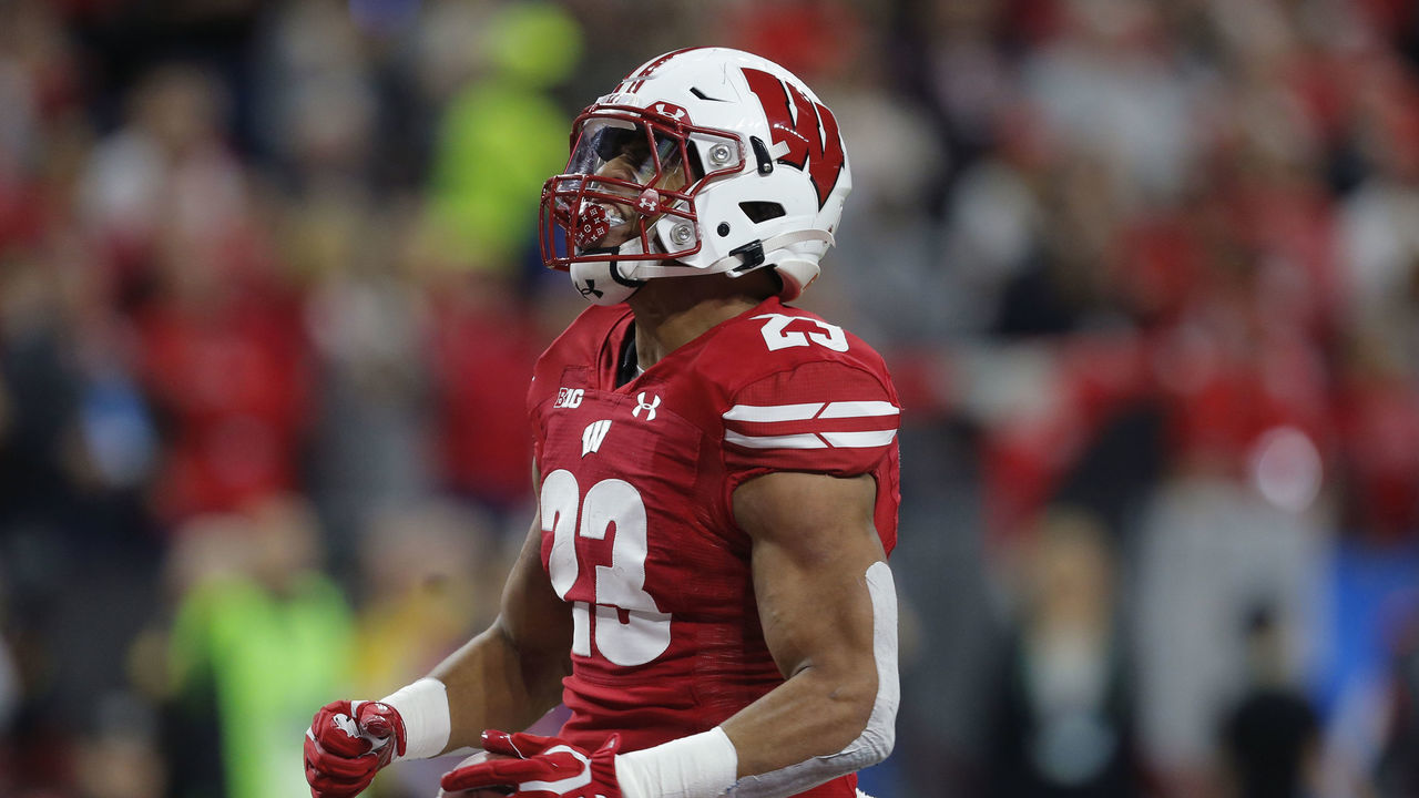 INDIANAPOLIS, IN - DECEMBER 07: Wisconsin Badgers running back Jonathan Taylor (23) celebrates his touchdown during the Big 10 Championship game between the Wisconsin Badgers and Ohio State Buckeyes on December 7, 2019, at Lucas Oil Stadium in Indianapolis, IN.
