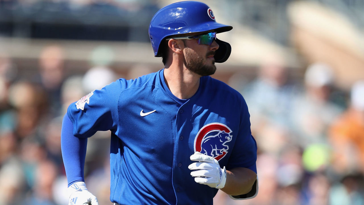 PEORIA, ARIZONA - FEBRUARY 24: Kris Bryant #17 of the Chicago Cubs draws a walk against the Seattle Mariners during the first inning of the MLB spring training game at Peoria Stadium on February 24, 2020 in Peoria, Arizona.