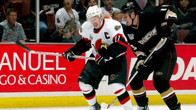 ANAHEIM, CA - JUNE 06: Daniel Alfredsson #11 of the Ottawa Senators is challenged by Ryan Getzlaf #15 of the Anaheim Ducks during the third period of Game Five of the 2007 Stanley Cup finals against the Anaheim Ducks on June 6, 2007 at Honda Center in Anaheim, California. The Ducks won the Stanley Cup with the score of 6-2.