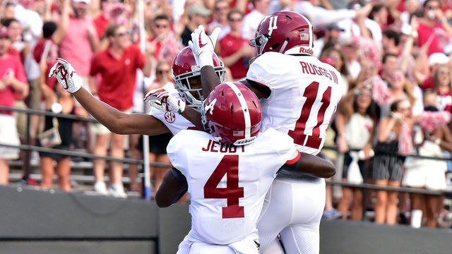 NASHVILLE, TN - SEPTEMBER 23: Jerry Jeudy #4 and Henry Ruggs III #11 of the Alabama Crimson Tide celebrates with DeVonta Smith #6 after his scoring a touchdown against the Vanderbilt Commodores during the second half at Vanderbilt Stadium on September 23, 2017 in Nashville, Tennessee.